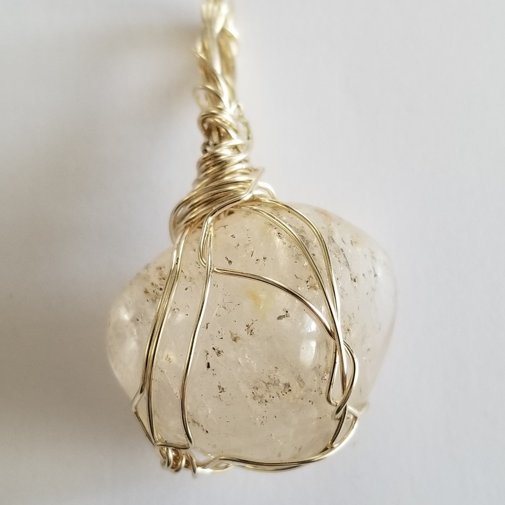 Handmade wire wrapped pendant clear stone with inclusions silver tone